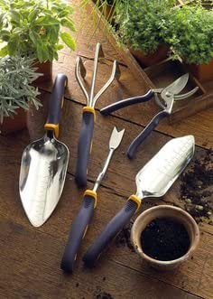 A trowel, shears shovel gardening set by Cutco.