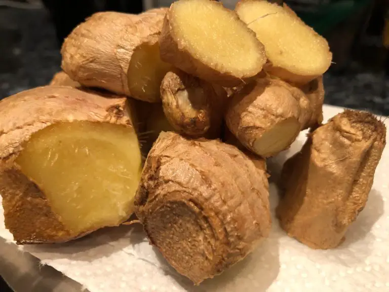 Cut up ginger ready to cure.