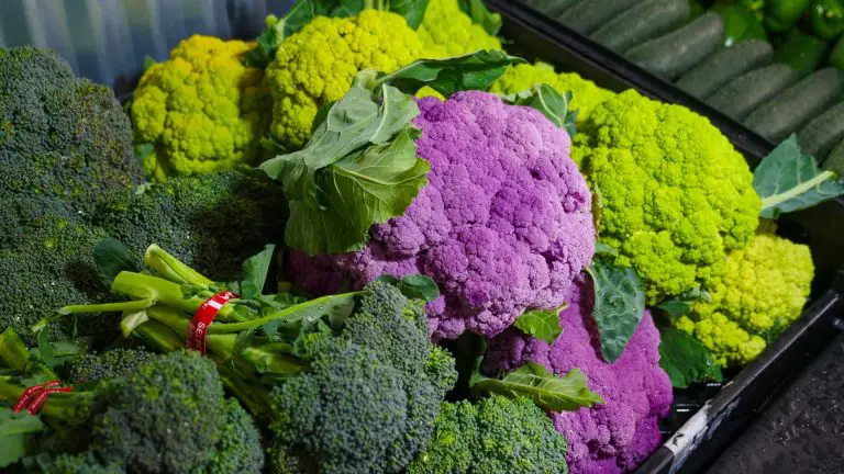 A close up of red and green cauliflower.